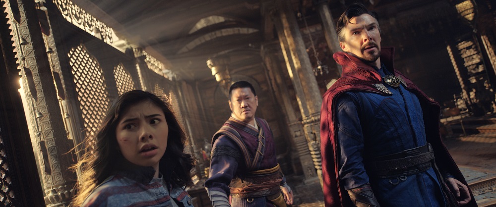 Xochitl Gomez as America Chavez, Benedict Wong as Wong, and Benedict Cumberbatch as Dr. Stephen Strange in Marvel Studios' DOCTOR STRANGE IN THE MULTIVERSE OF MADNESS. Photo courtesy of Marvel Studios. ©Marvel Studios 2022. All Rights Reserved.